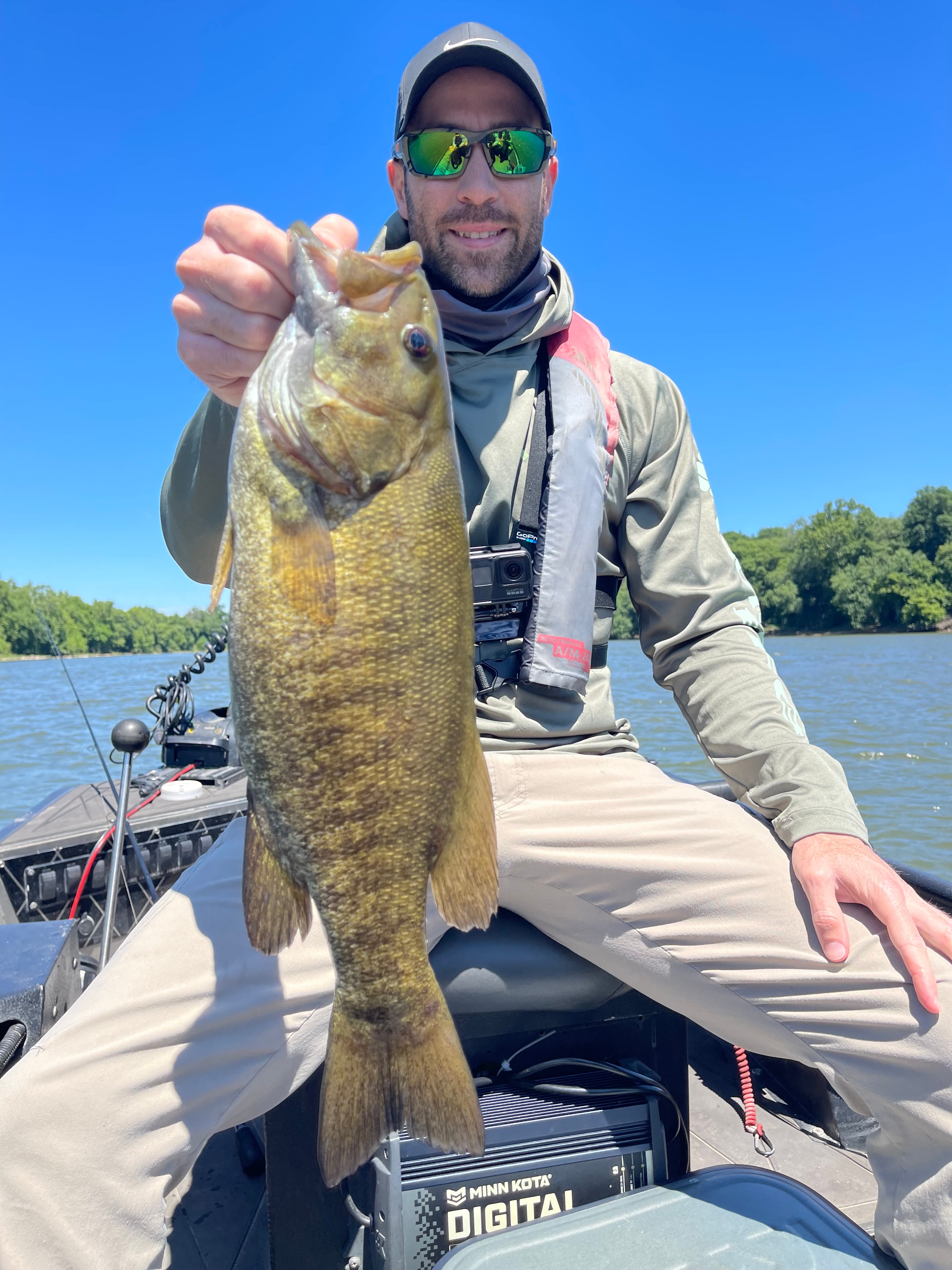 Client holding a massive smallmouth bass