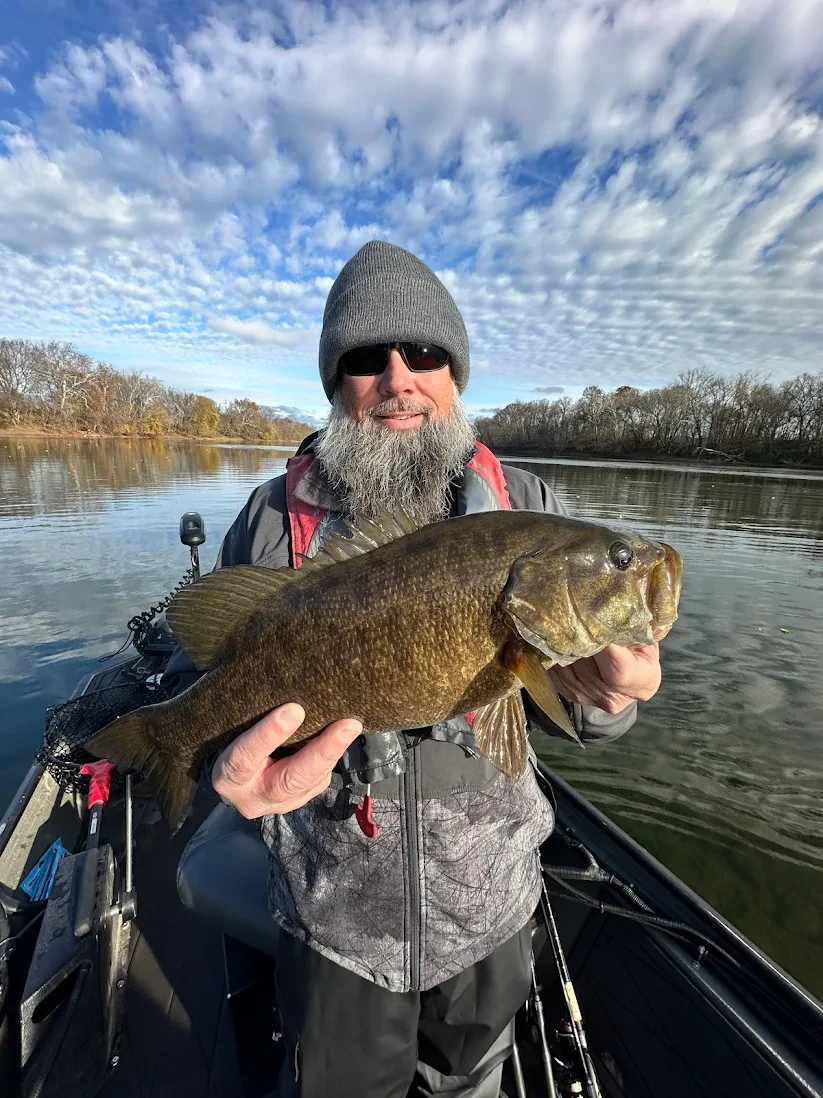 Angler with a smallmouth bass on the Potomac River